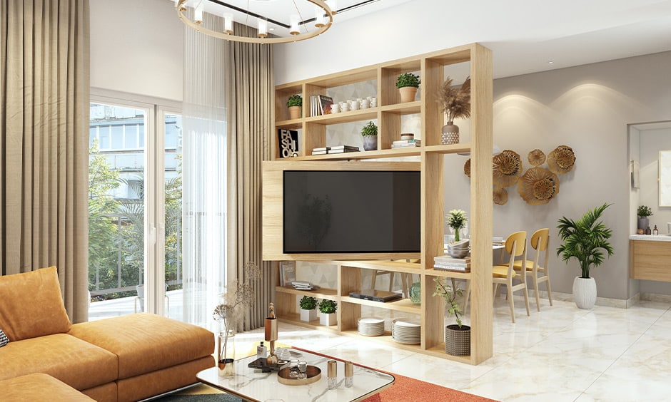 A Modern Living Room With A TV Unit Designed With Storage