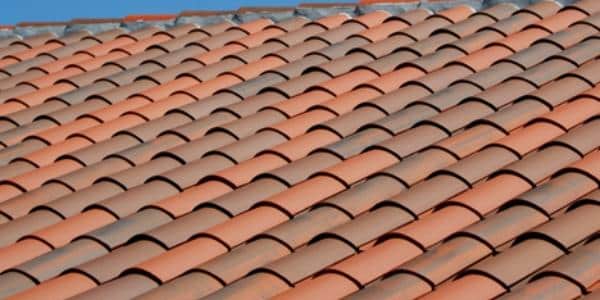 The Pros And Cons Of Metal And Clay Roof Tiles Which One Reigns Supreme?